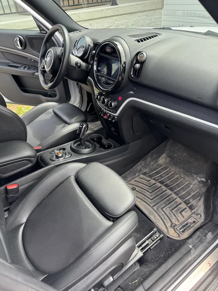 Black vehicle interior after deep cleaning